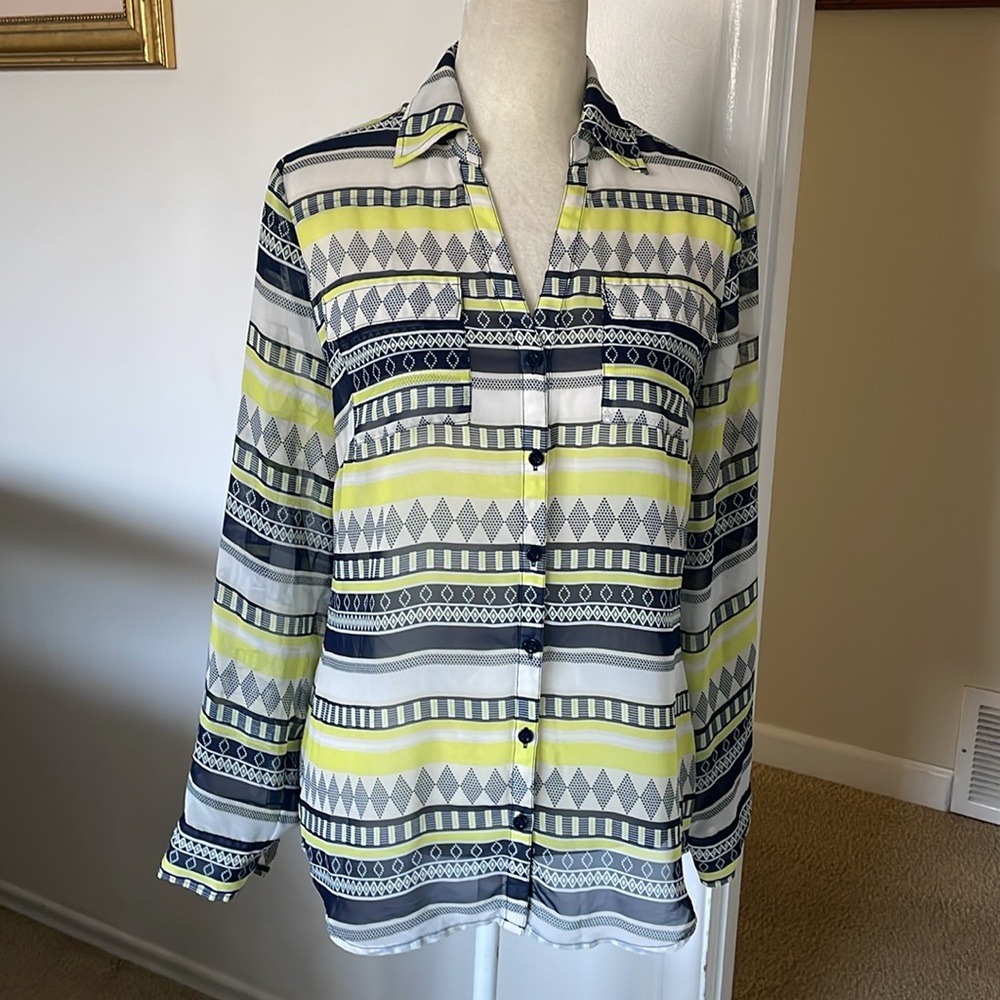 New York & Company.
V-Neck Button Front Long Sleeve Lightweight Blouse.